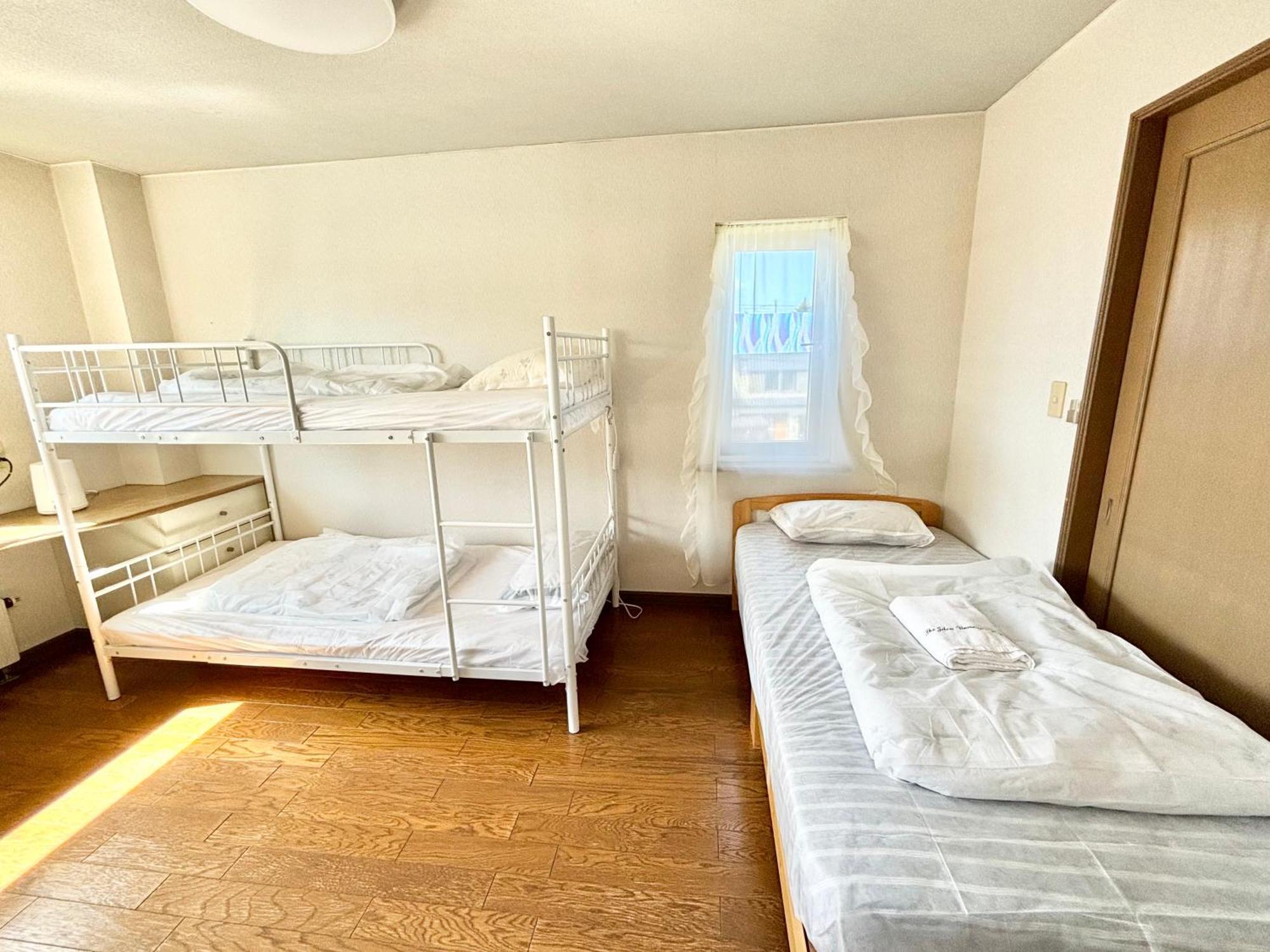 Séjour chez l'habitant Sharehouse新琴似,駐車無料要予約,車で最寄り駅お迎え可能要予約,麻生駅バス直通